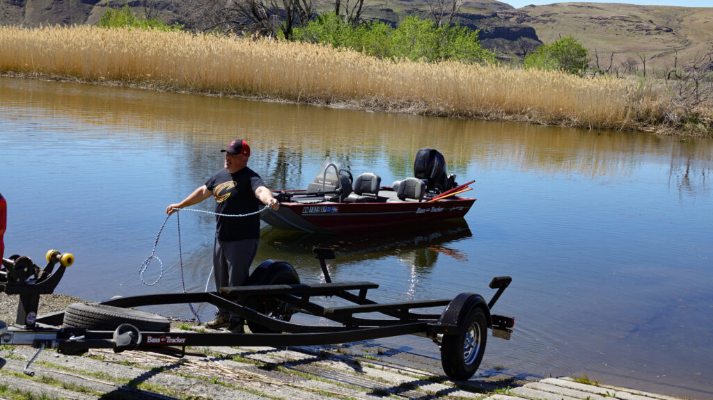 guy launching boat